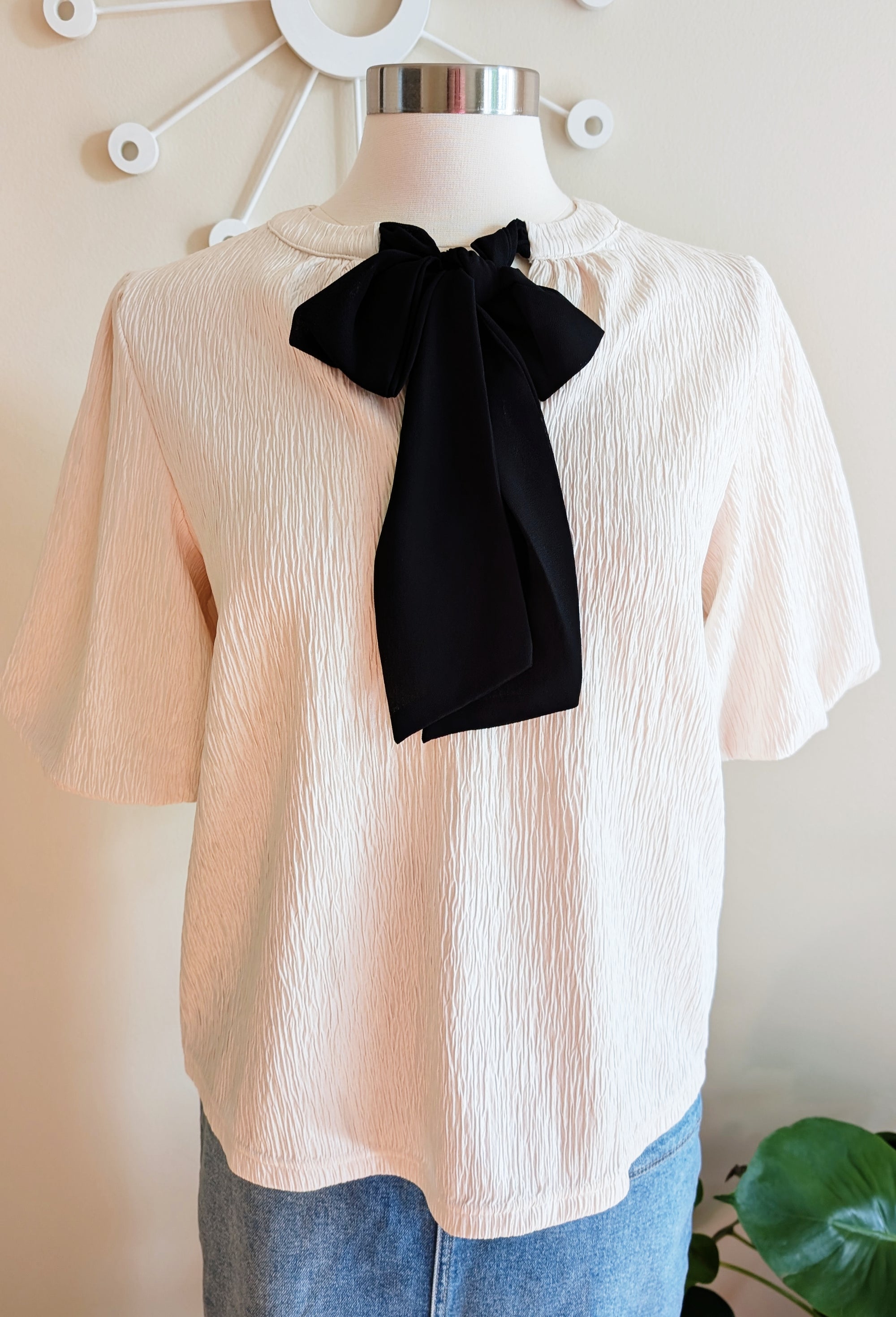 ivory blouse with black bow