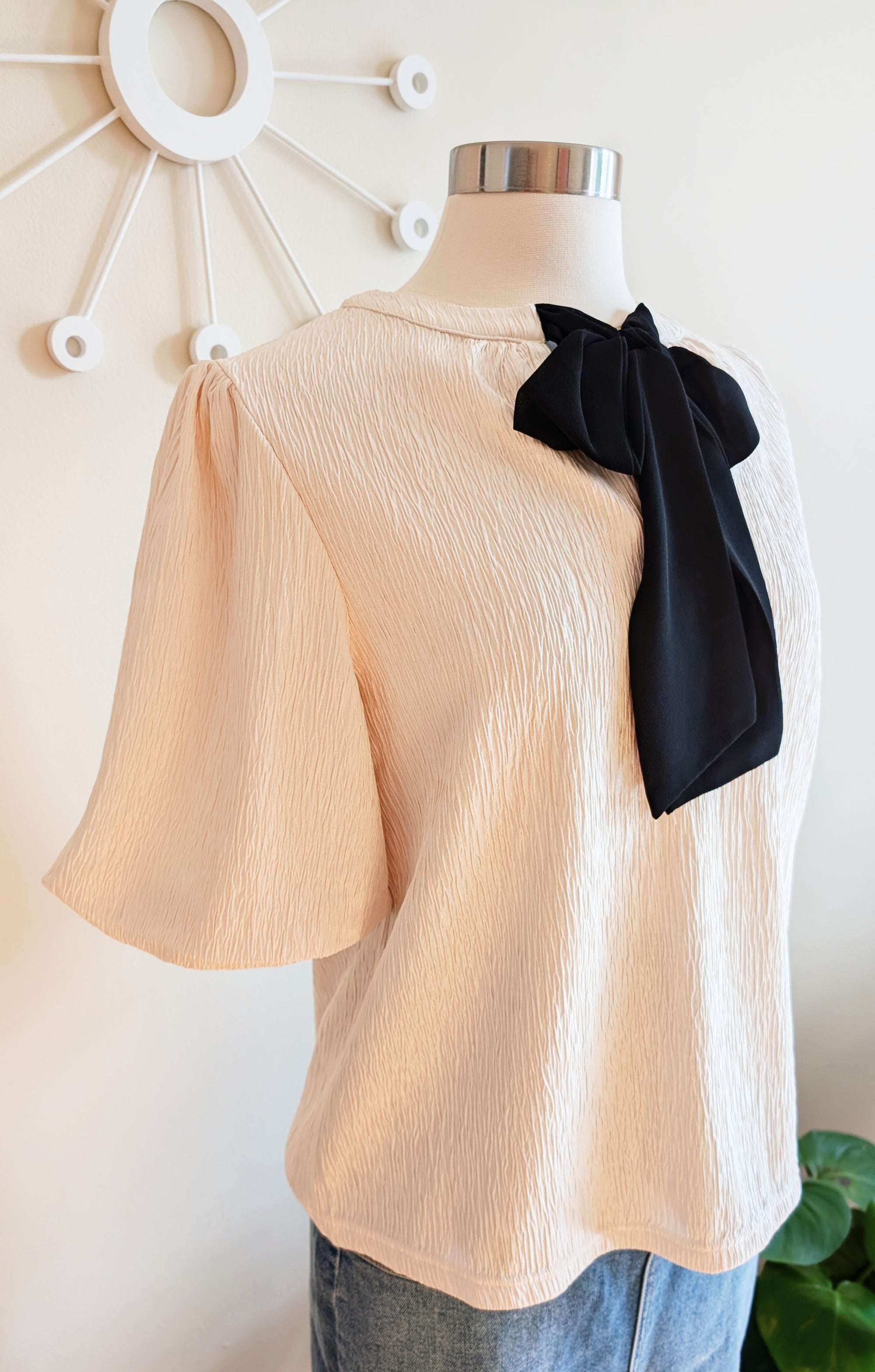 ivory blouse with black bow